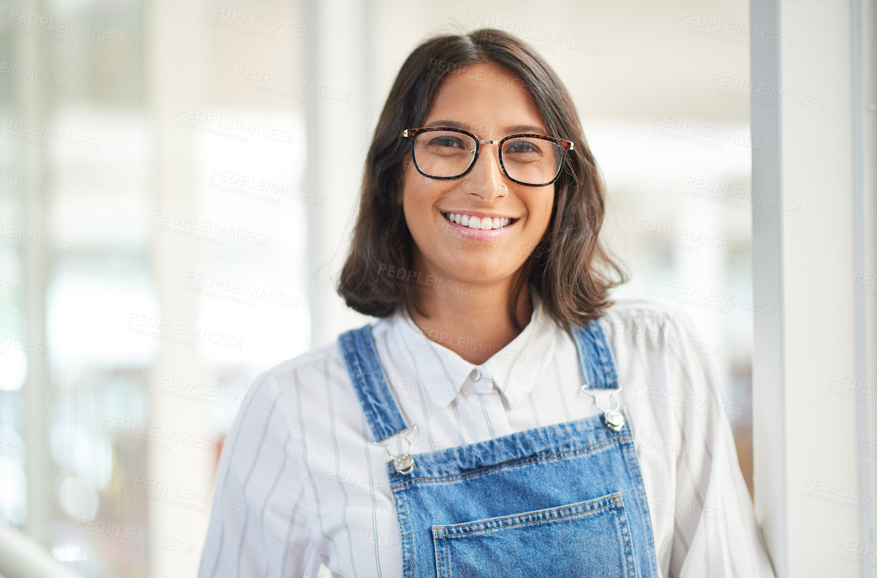 Buy stock photo Portrait, creative and happy business woman at startup for career or job opportunity in Spain. Glasses, face or confident entrepreneur, employee or expert publisher with work experience in enterprise