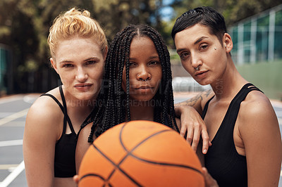 Buy stock photo Portrait of a group of sporty young women standing together on a sports court