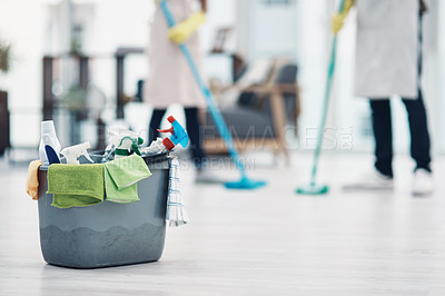 Buy stock photo Shot of an unrecognisable couple mopping the floor at home