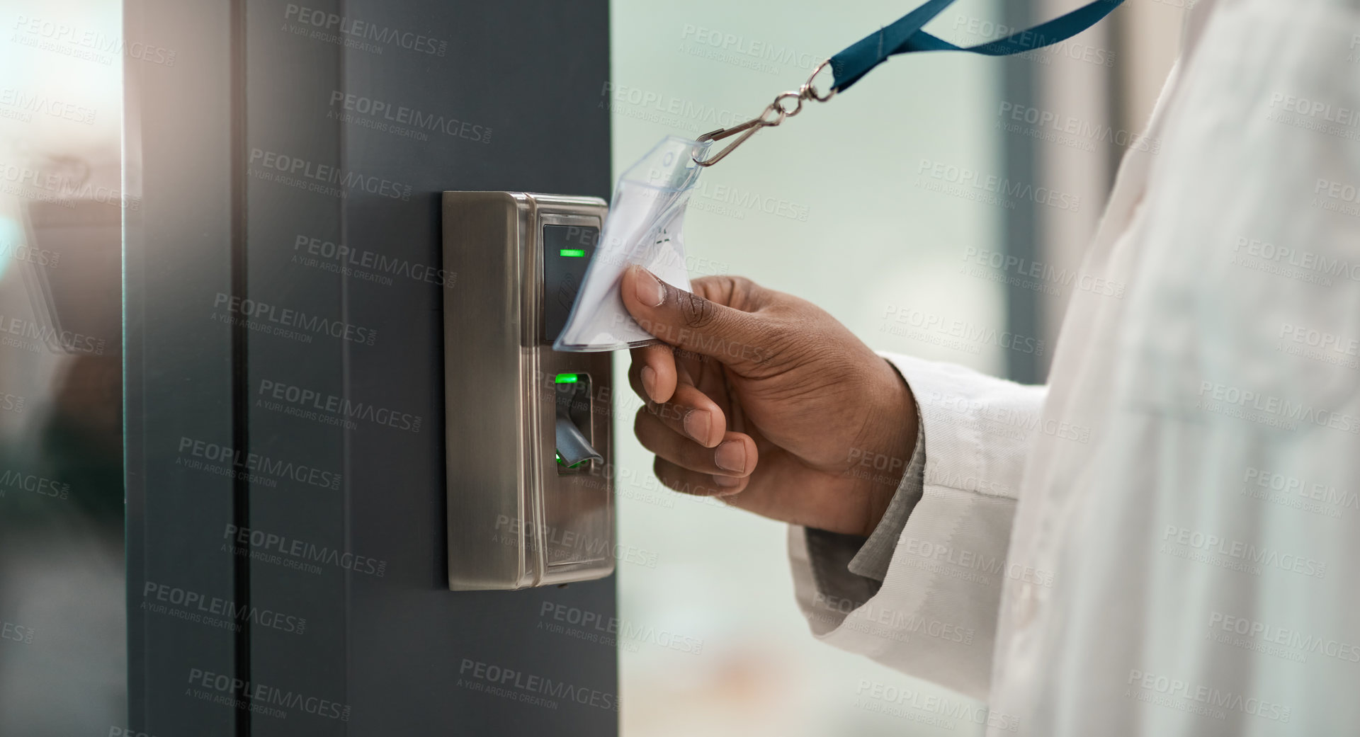 Buy stock photo Closeup shot of an unrecognisable scientist using an access card to gain entry at a door