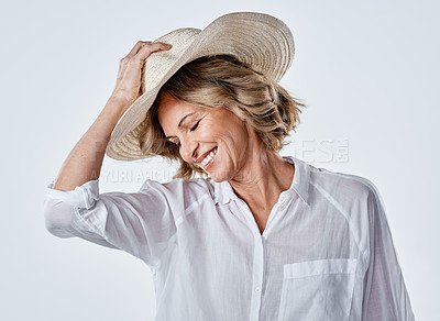 Buy stock photo Cropped shot of a mature woman looking stylish against a white background