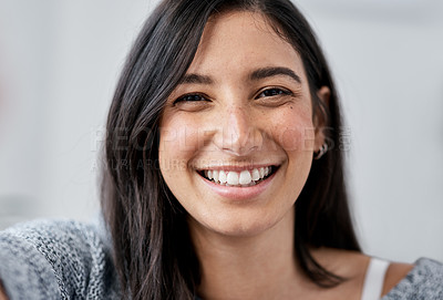 Buy stock photo Portrait of a happy young woman taking a selfie art home