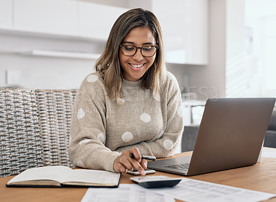 Buy stock photo Cropped shot of a beautiful young woman working from home