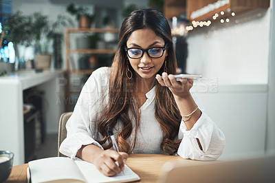 Buy stock photo Voice note, talking and woman in office, notes and schedule for meeting, receptionist and planning. Professional, conversation and writing of appointment, assistant and person with smartphone