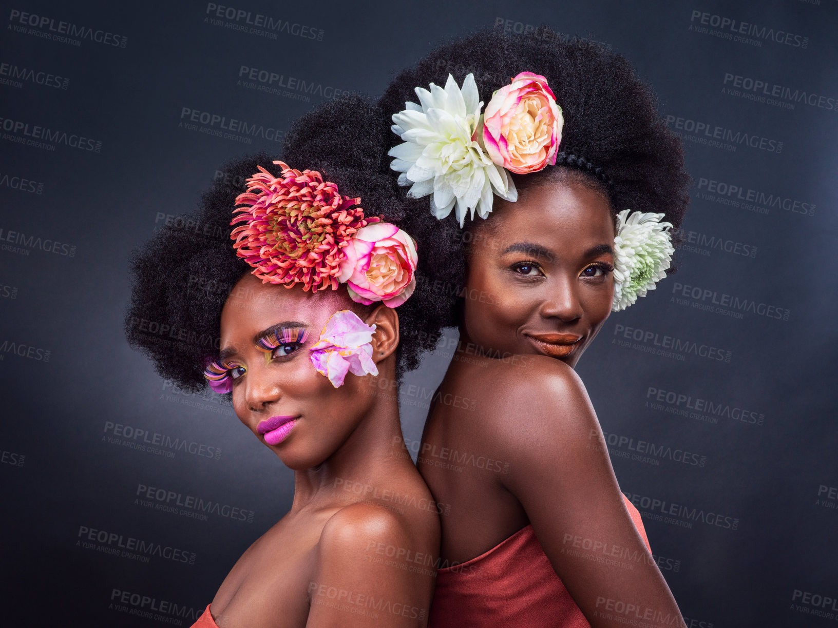Buy stock photo African, beauty and friends with flowers in makeup and art in dark background, studio and mockup. Floral, cosmetics and black woman in portrait with creativity in spring or sustainable skincare