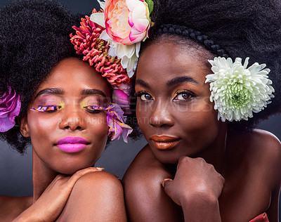 Buy stock photo Creative, beauty and black woman with flowers in makeup and art in dark background, studio and mockup. Floral, cosmetics and friends in portrait with natural or sustainable skincare for spring