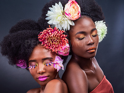 Buy stock photo African, women and flowers in natural makeup on studio with gentle skincare with plants. Daisy, rose and peonies for wellness in beauty, cosmetics in spring and sustainable treatment for afro or hair