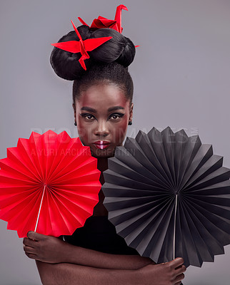 Buy stock photo Portrait, makeup and origami with black woman in studio for creative, art and culture. Traditional, cosmetics and paper design with female model on grey background for asian, beauty and color