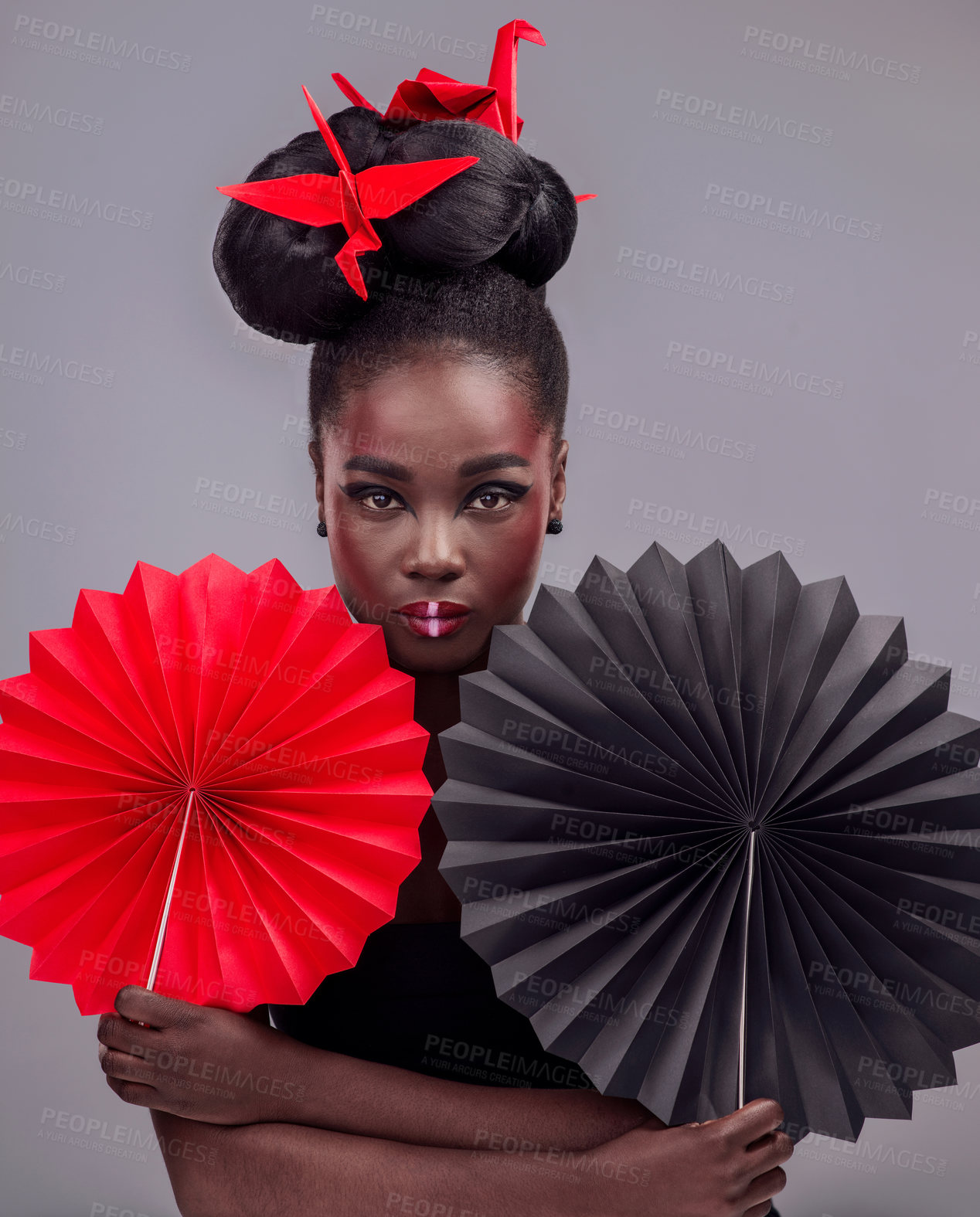 Buy stock photo Portrait, makeup and origami with black woman in studio for creative, art and culture. Traditional, cosmetics and paper design with female model on grey background for asian, beauty and color