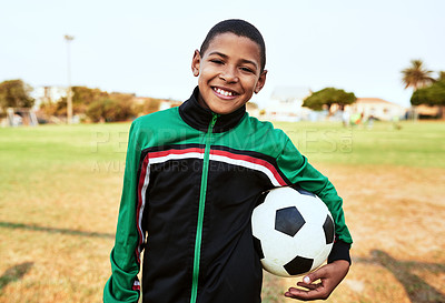 Buy stock photo Portrait of a young boy playing soccer on a sports field