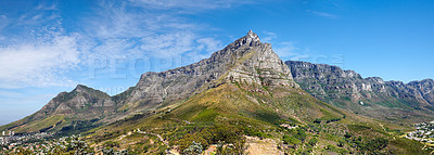 Buy stock photo Panoramic landscape view of the majestic Table Mountain, Cape Town, South Africa. Beautiful scenery of a popular tourist attraction, destination and national landmark with cloudy blue sky copy space