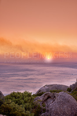 Buy stock photo Sunset at rocky coast of Western Cape, South Africa.