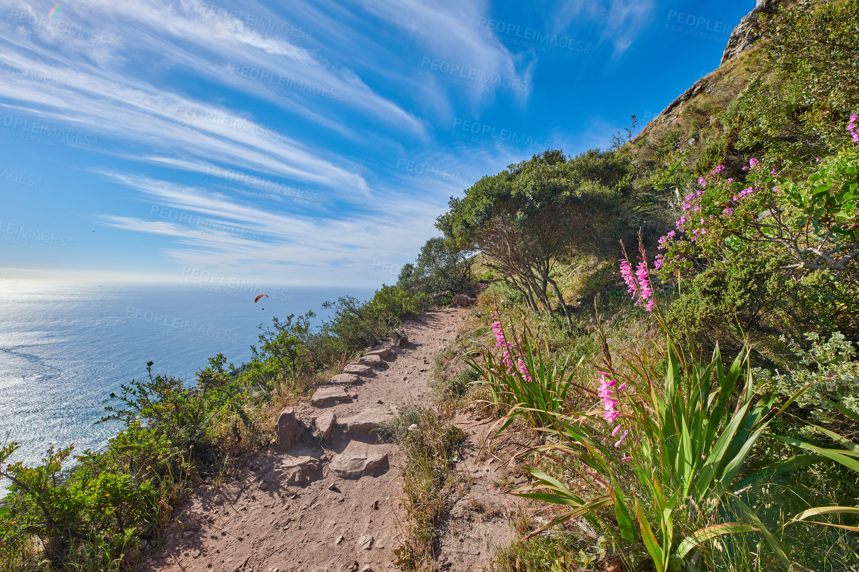 Buy stock photo Beautiful mountain trail for hiking and adventure. Explore the rough terrain and mountainous beauty of the coast. Take a scenic journey in the isolated nature reserve of Table Mountain National park