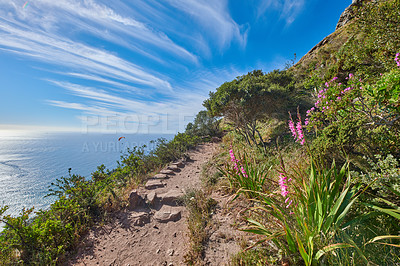 Buy stock photo Beautiful mountain trail for hiking and adventure. Explore the rough terrain and mountainous beauty of the coast. Take a scenic journey in the isolated nature reserve of Table Mountain National park