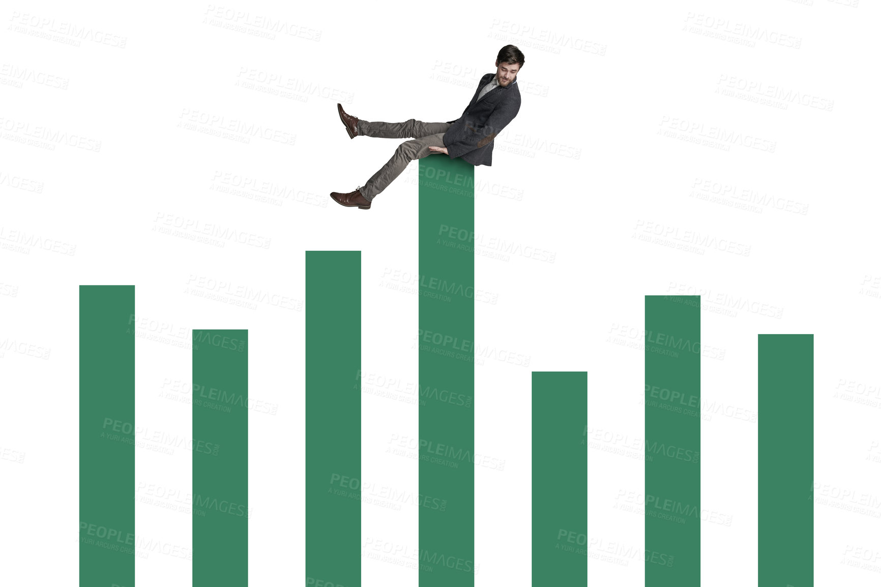 Buy stock photo Shot of a businessman balancing on top of a graph against a white background