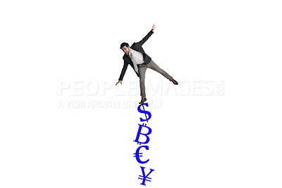 Buy stock photo Shot of a businessman balancing on top of financial symbols against a white background