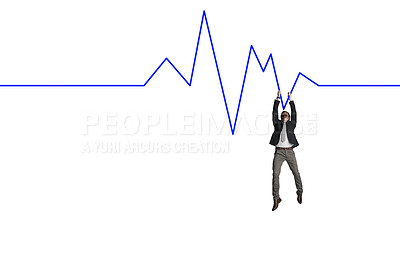 Buy stock photo Shot of a businessman hanging onto a graph against a white background