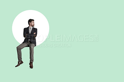 Buy stock photo Shot of a businessman looking thoughtful at a graph against a green background