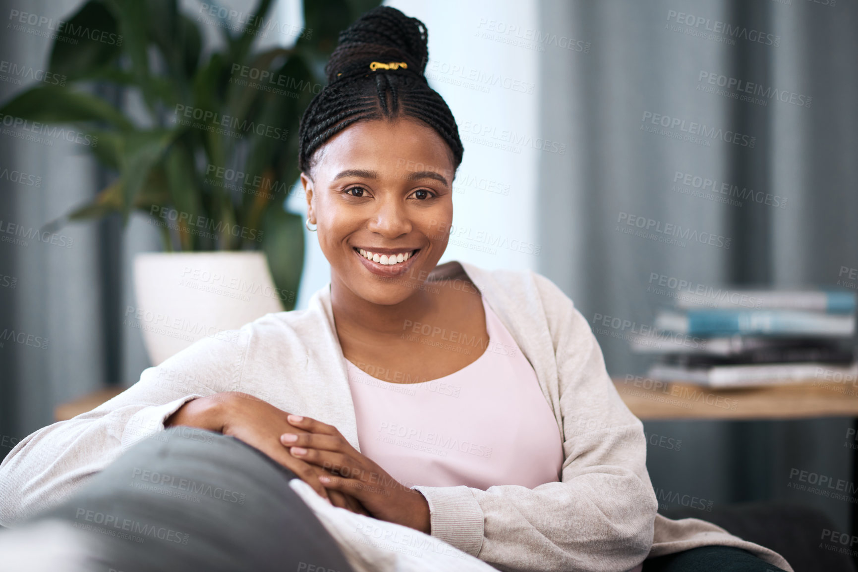 Buy stock photo Black woman, smile and portrait on sofa in home with happiness, self love and relax in living room. Happy, African woman and student on lounge couch in house, flat or apartment to rest in free time