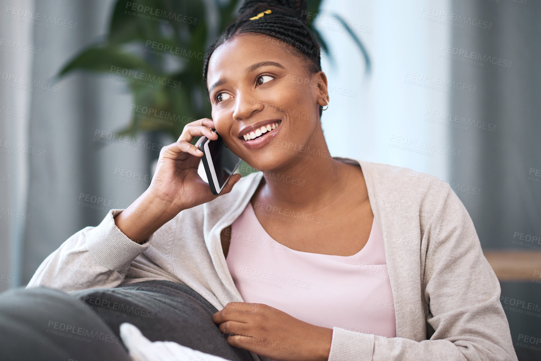 Buy stock photo Happy, phone call and black woman on home sofa with internet connection, communication and smile. Relax, conversation and happiness of girl in South African house with smartphone connectivity.