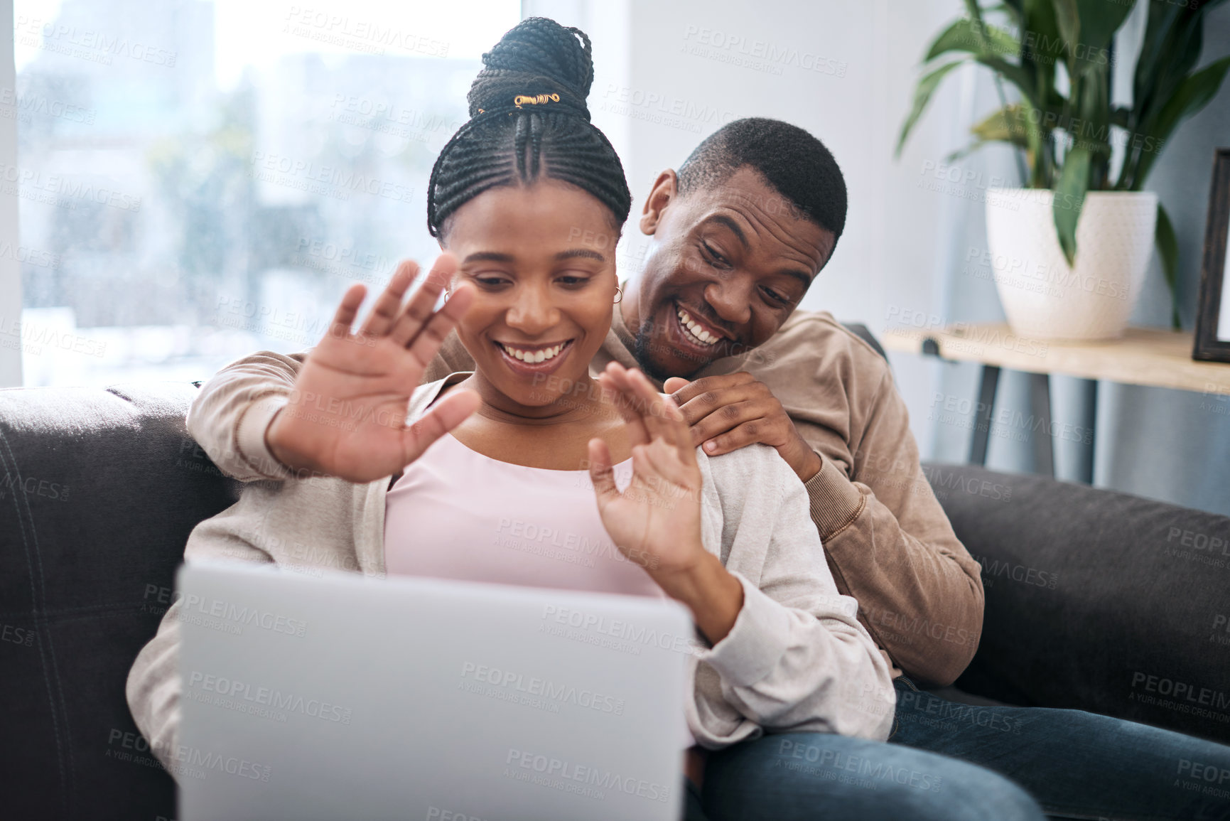 Buy stock photo Wave, black couple and video call on laptop, smile and happy to connect, at home and on sofa. Pc, young man and woman chatting online, conversation and talking for happiness, joy and in living room.