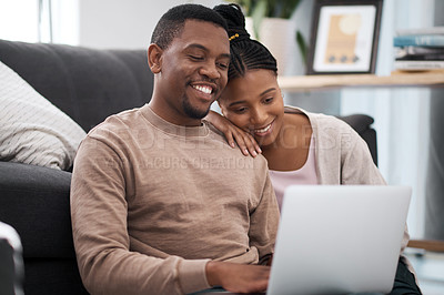 Buy stock photo Relax, laptop and couple on floor for internet, search and social media entertainment in their home. Love, black family and woman with man reading online news, post or streaming show in living room