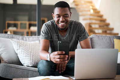 Buy stock photo Laptop, phone and man on sofa for remote work, internet and search while working on freelance project. Freelancer, text and computer writing by designer guy searching for creative idea, tips and plan