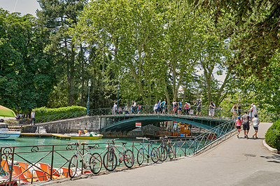 Buy stock photo Annecy, France, July, 17, 2019: Houses and street life in the famous medieval part of the city of Annecy, Department of Upper Savoy, France.