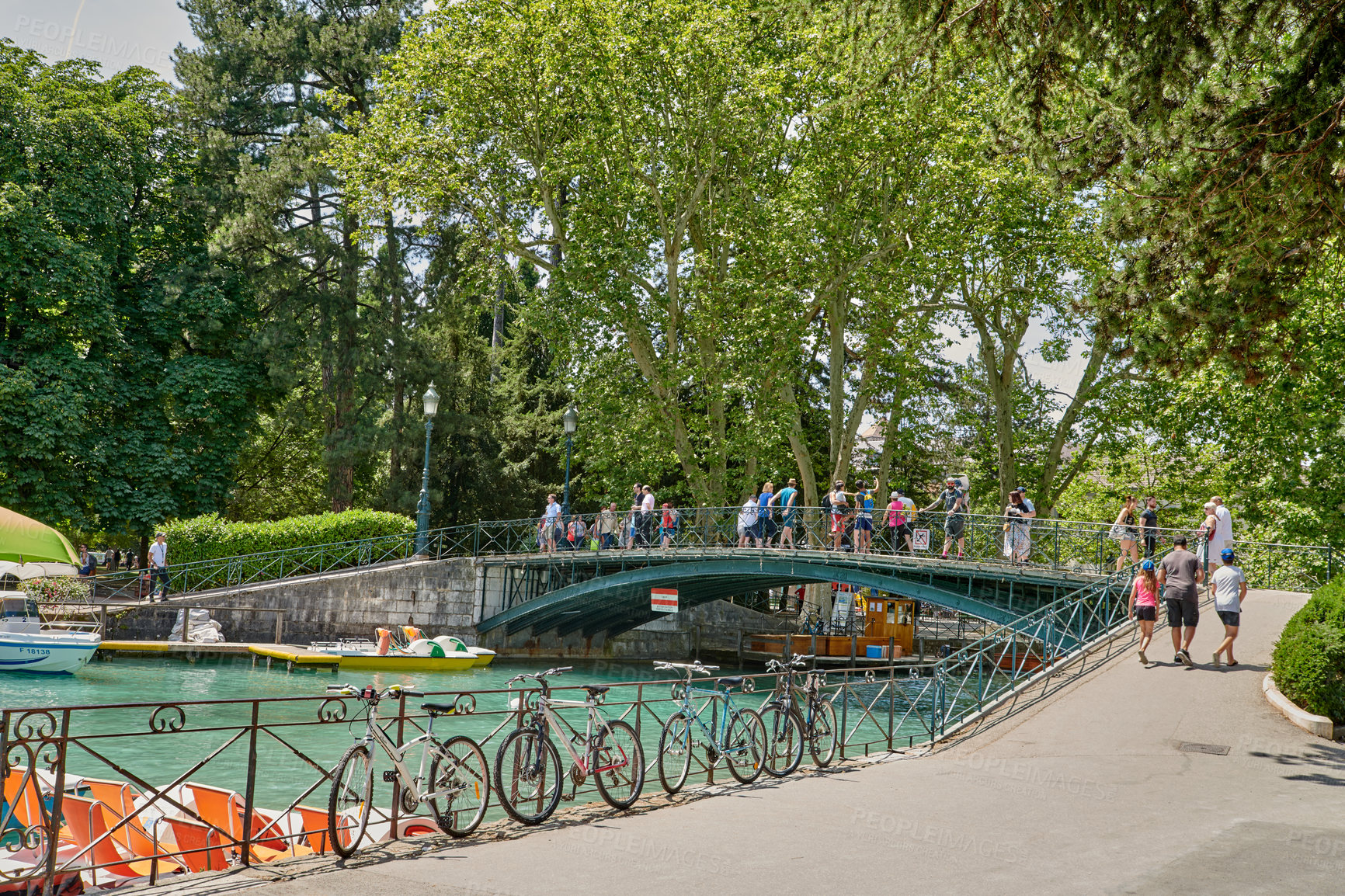 Buy stock photo Annecy, France, July, 17, 2019: Houses and street life in the famous medieval part of the city of Annecy, Department of Upper Savoy, France.