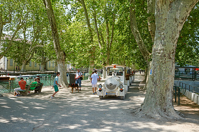 Buy stock photo Annecy, France, July, 17, 2019: Houses and street life in the famous medieval part of the city of Annecy, Department of Upper Savoy, France.