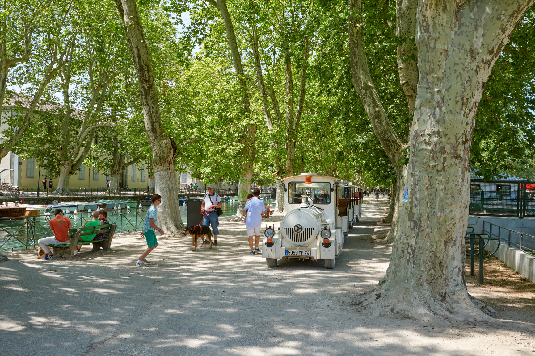 Buy stock photo Annecy, France, July, 17, 2019: Houses and street life in the famous medieval part of the city of Annecy, Department of Upper Savoy, France.