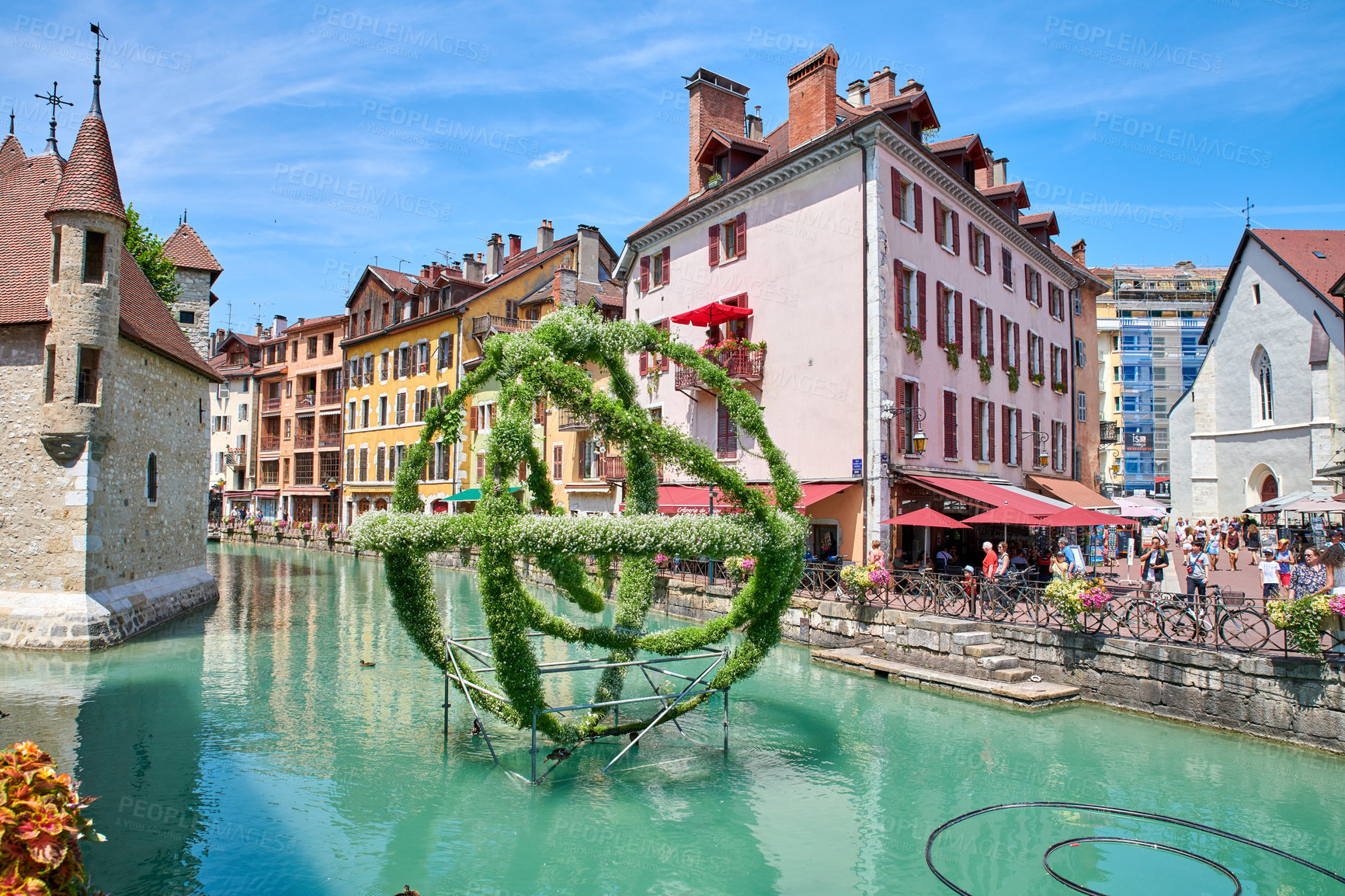 Buy stock photo Annecy, France, July, 17, 2019: Houses and street life in the famous medieval part of the city of Annecy, Department of Upper Savoy, France.