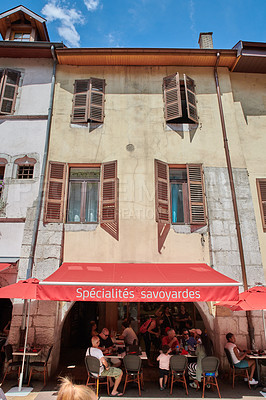 Buy stock photo Annecy, France, July, 17, 2019: Houses and street life in the famous medieval part of the city of Annecy, Department of Upper Savoy, France.