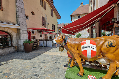 Buy stock photo Annecy, France, July, 17, 2019: Houses and street life in the famous medieval part of the city of Annecy, Department of Upper Savoy, France.