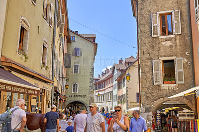 Buy stock photo Annecy, France, July, 17, 2019: Houses and street life in the famous medieval part of the city of Annecy, Department of Upper Savoy, France.