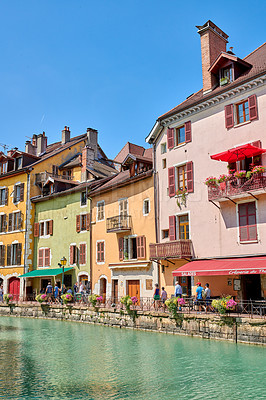 Buy stock photo Annecy, France, July, 17, 2019: Houses and street life in the famous medieval part of the city of Annecy, Department of Upper Savoy, France.