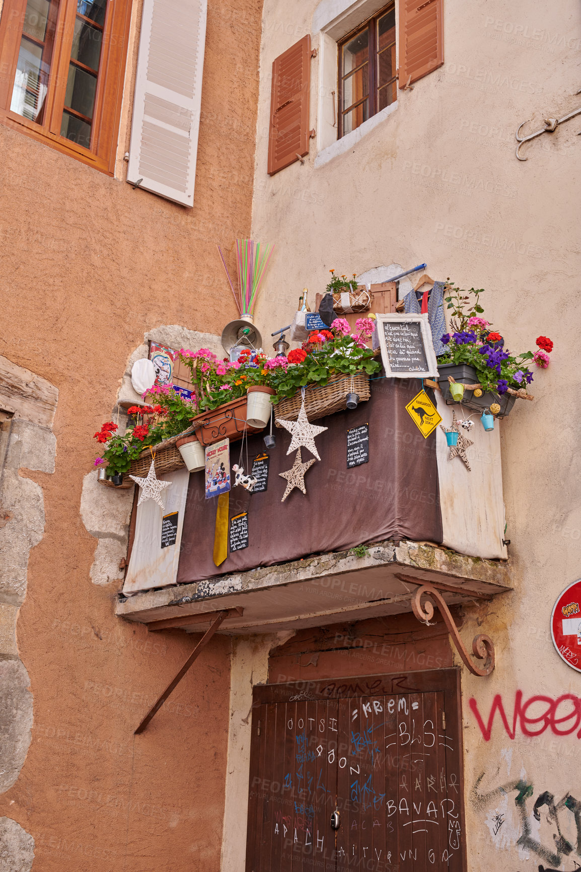 Buy stock photo Annecy, France, July, 17, 2019: Houses and street life in the famous medieval part of the city of Annecy, Department of Upper Savoy, France.