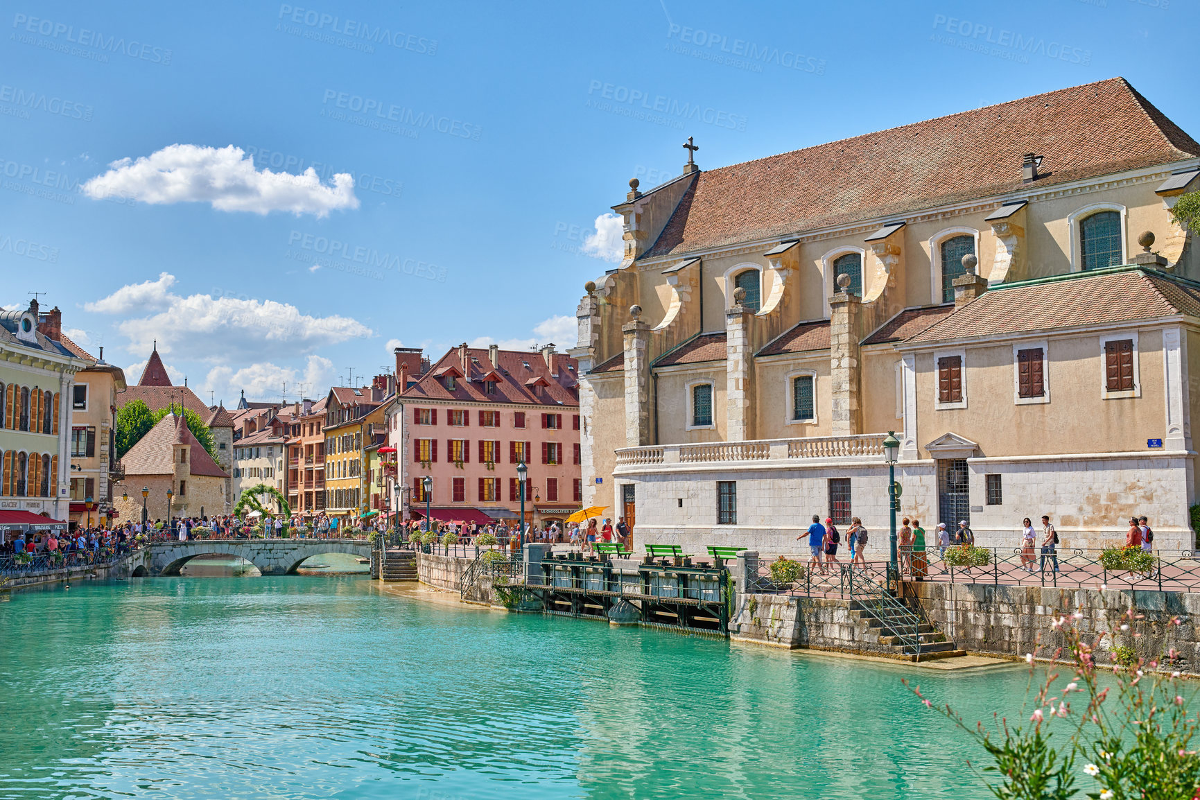 Buy stock photo Annecy, France, July, 17, 2019: Houses and street life in the famous medieval part of the city of Annecy, Department of Upper Savoy, France.