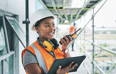 Buy stock photo Construction worker with tablet, walkie talkie or radio talking, instructing and checking building progress on development site. Architect manager, female leader or engineer watching infrastructure 