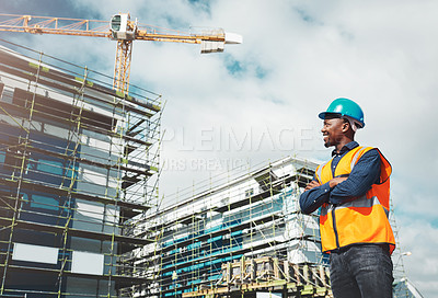 Buy stock photo Engineer, construction and a man thinking of development at building site with architecture. Black male contractor happy about project management, engineering and safety inspection outdoor in city