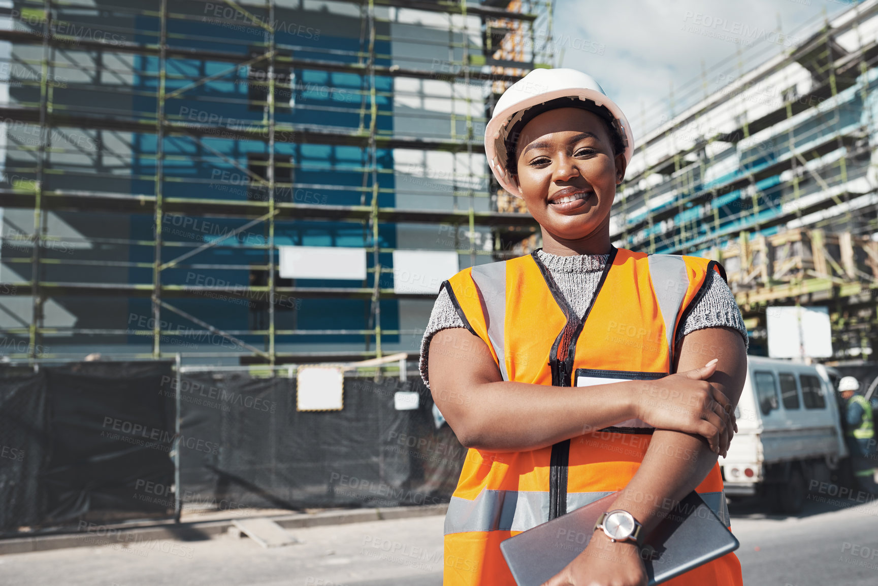 Buy stock photo Engineer, construction site and portrait of a black woman outdoor for development and architecture. African female contractor happy about building project, engineering and safety inspection in city
