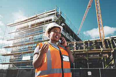 Buy stock photo Black woman, engineer talking and outdoor with phone call, contact and inspector for property plan. Low angle, construction and contractor speaking to client, communication app and urban project