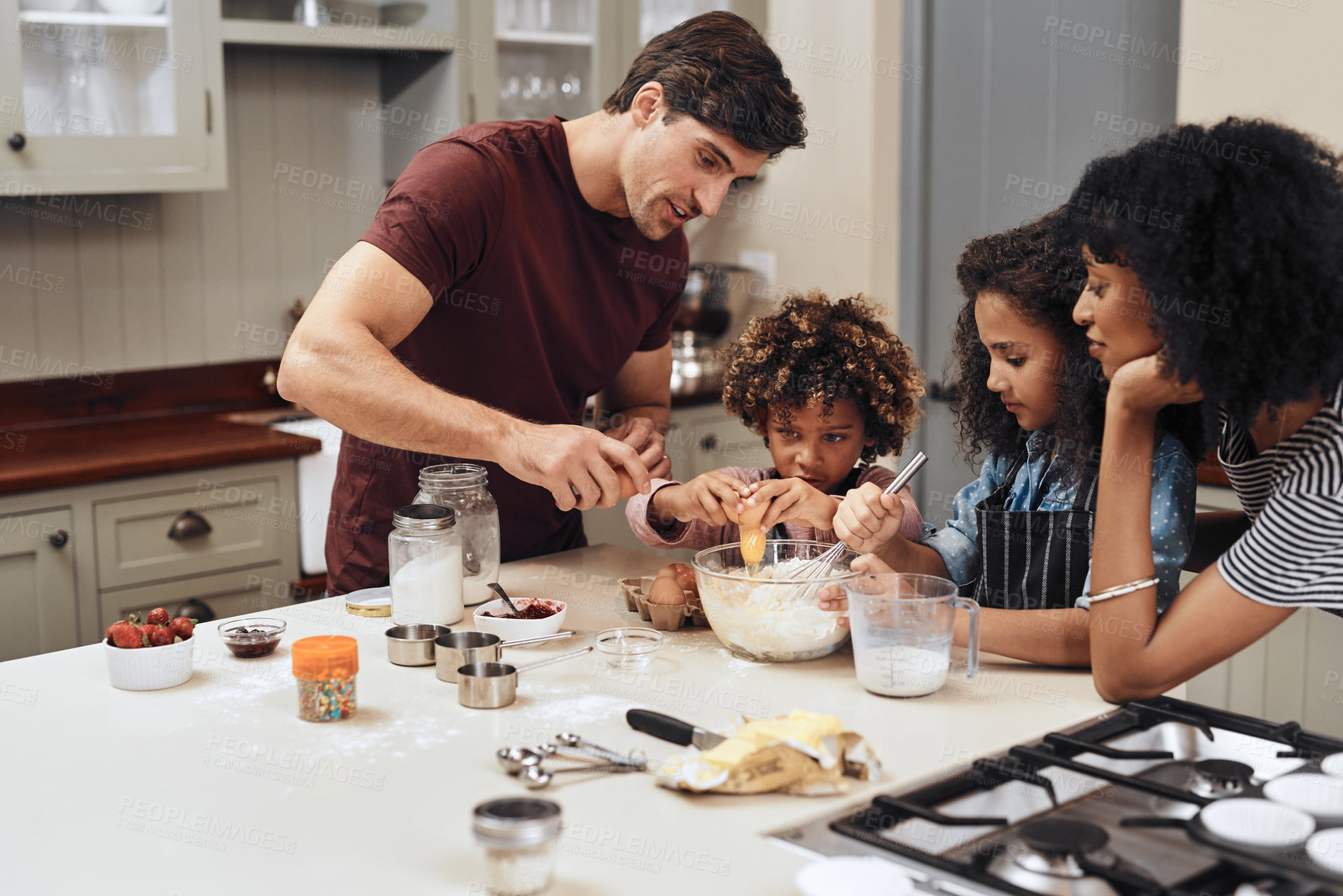 Buy stock photo Home, family and baking with recipe, ingredients and care with hobby, routine and time together. Apartment, parents and mother with father in kitchen, children or kids with utensils, help or teaching