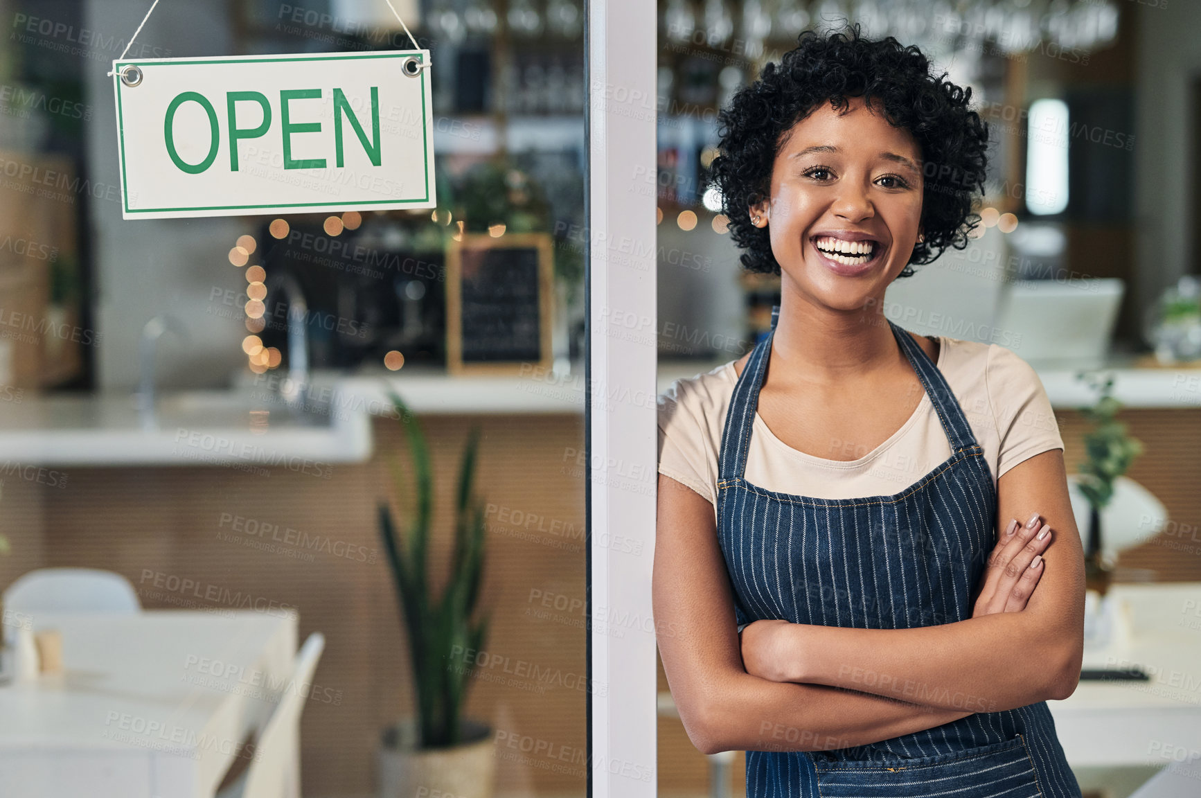 Buy stock photo Portrait of a young woman standing alongside an 