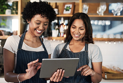 Buy stock photo Happy woman, tablet and waitress in teamwork at cafe for inventory, checking stock or orders at restaurant. Barista women or small business team working on technology at coffee shop in online service