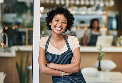 Buy stock photo Happy woman, portrait and arms crossed at cafe in small business or waitress at entrance. Confident African female person, barista or restaurant smiling in confidence for management at coffee shop