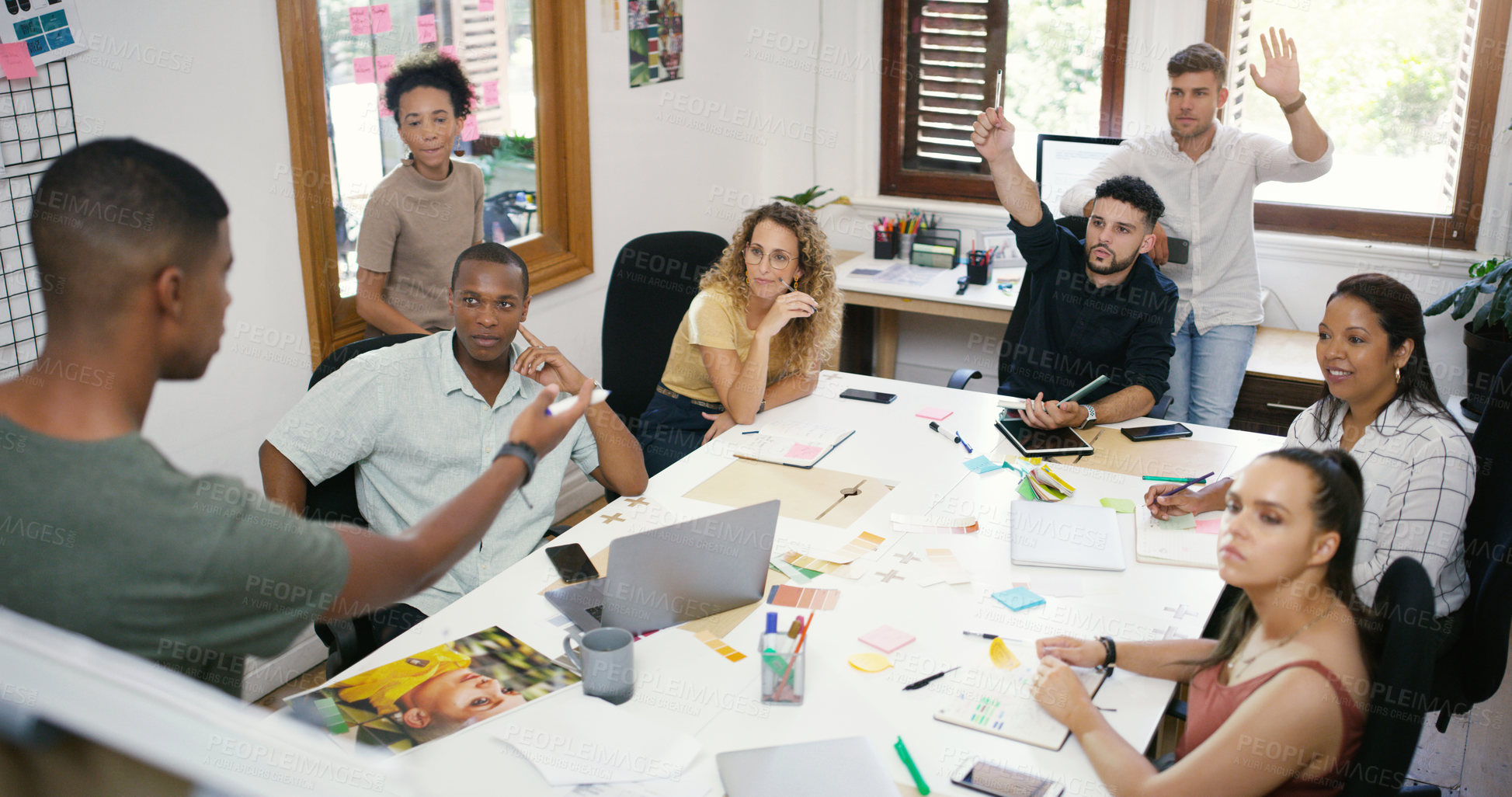 Buy stock photo Brainstorming, presentation and team in meeting in office boardroom for creative planning. Collaboration, diversity and group of marketing employees working on ideas for project together in workplace