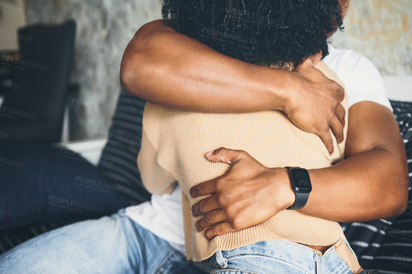 Buy stock photo Hands, couple and hug on couch at house for love, weekend romance and marriage relationship. Closeup, people and partner embrace for healthy connection, commitment and bonding together of break