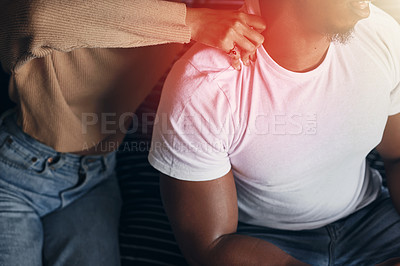 Buy stock photo Closeup shot of an unrecognisable woman massaging her partner's shoulders at home
