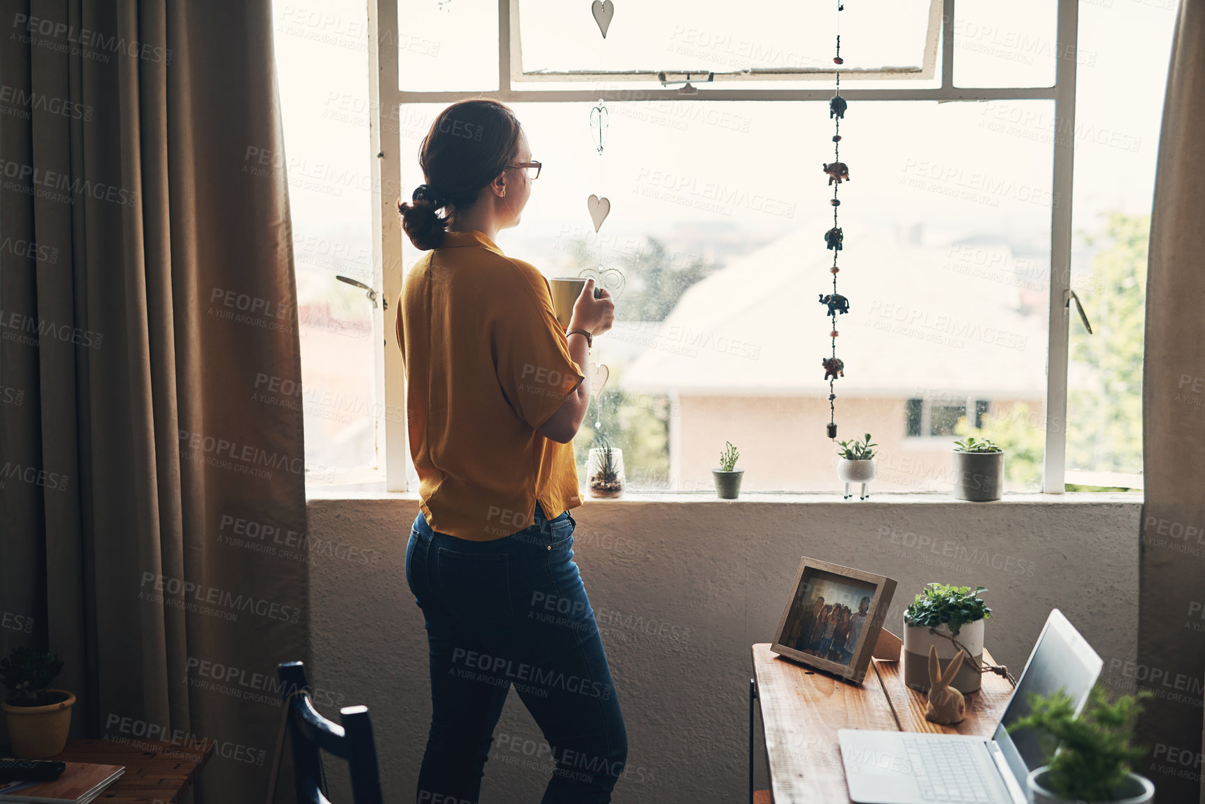 Buy stock photo Coffee, thinking and idea with woman at window for daily affirmation, relax and inspiration. Morning, vision and calm with female person and drinking tea at home for cozy, nostalgia and memory 